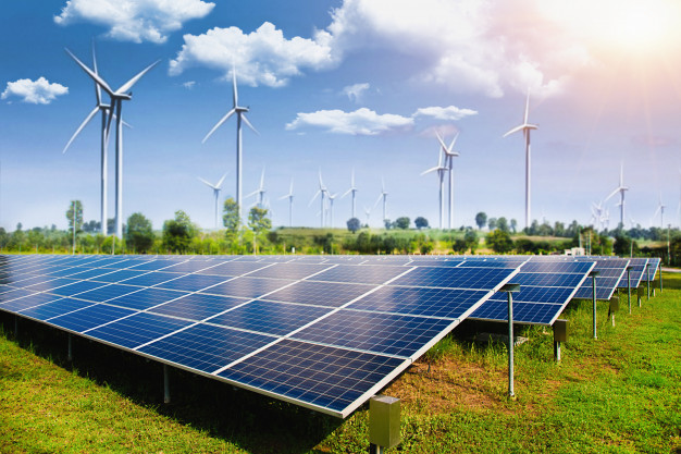 solar-panel-with-wind-turbines-against-mountains-sky_34237-198.jpg